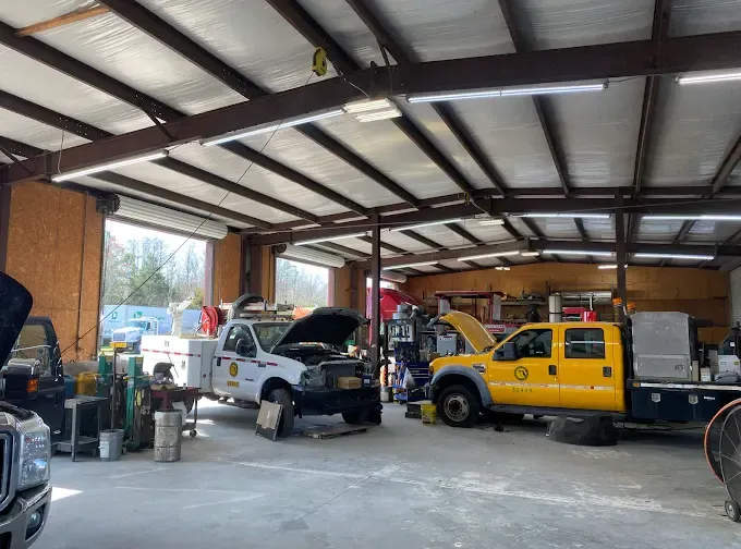 Service trucks being repaired inside the Southern Specialized shop in Lake City, FL
